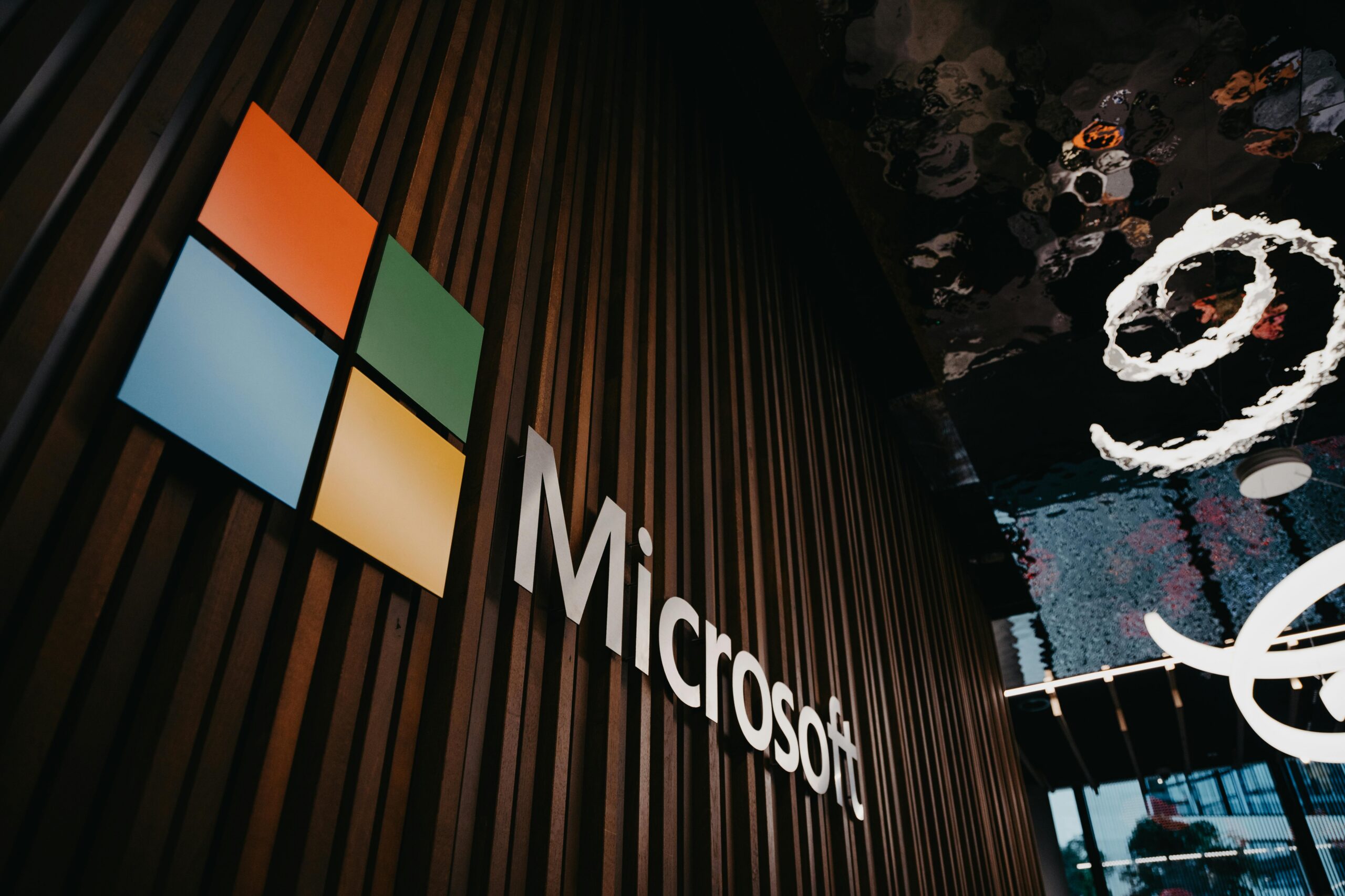 curriculum vitae Interior view of Microsoft office with logo on wooden wall in Brussels, Belgium.
